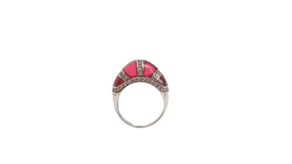 Elegant Trio of Treasures Silver Ring with radiant red inlay and intricate silver detailing.